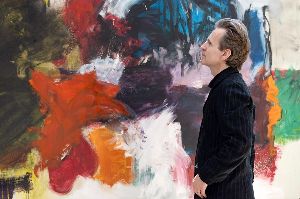 Man installing art